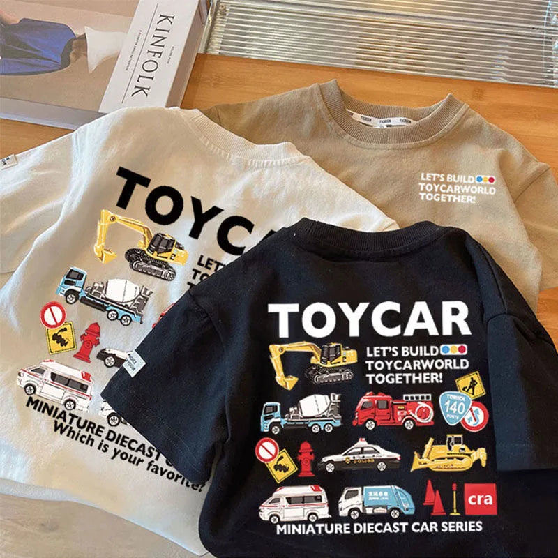 A black crew neck t-shirt featuring a design of various miniature diecast toy cars.