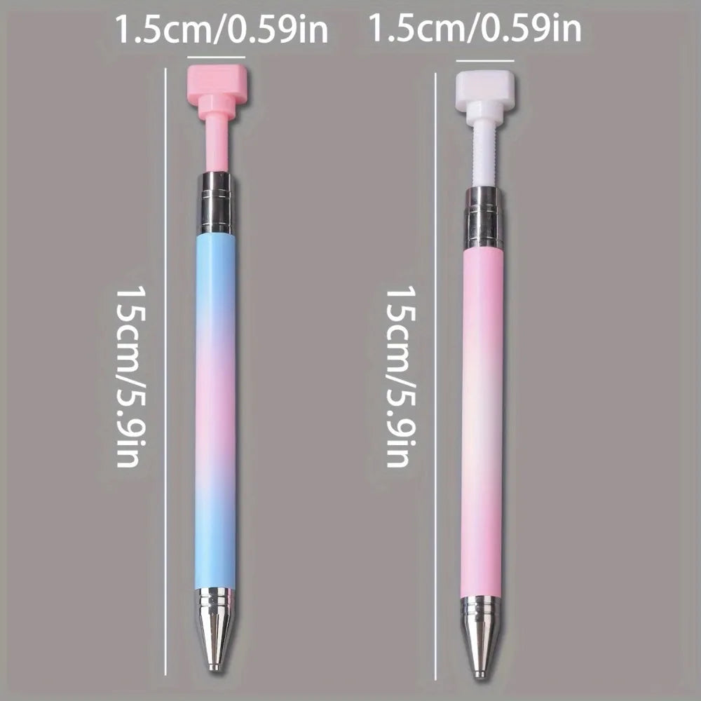 A pair of gradient rotating dotting pens shown side by side in pink and blue colors.