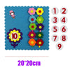 A felt board showing colorful flowers with numbers 1 through 10 arranged in a sequence.