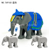 A set of six elephant building blocks in various shades of gray and blue.