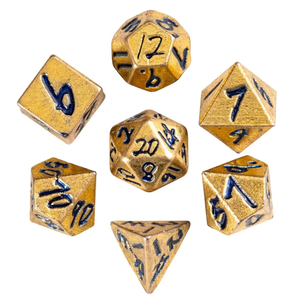 A set of ten gold-colored metal dice, including a d6, d8, d10, d12, d20, and d100, displayed in a box.