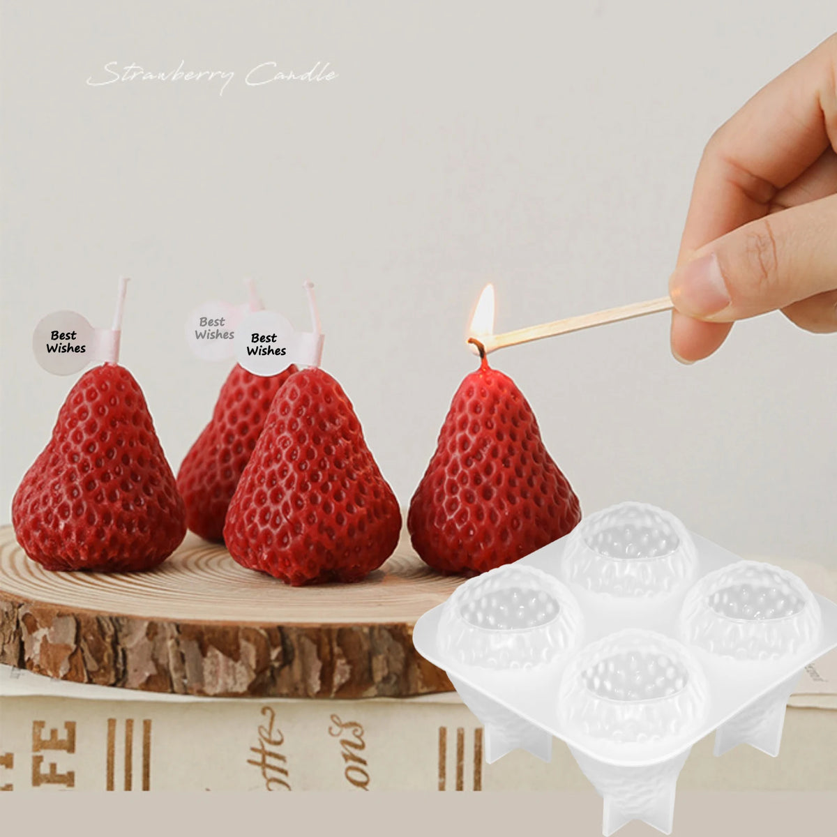 A hand holds a strawberry silicone mold used for making candles, soap, fondant, and epoxy resin.