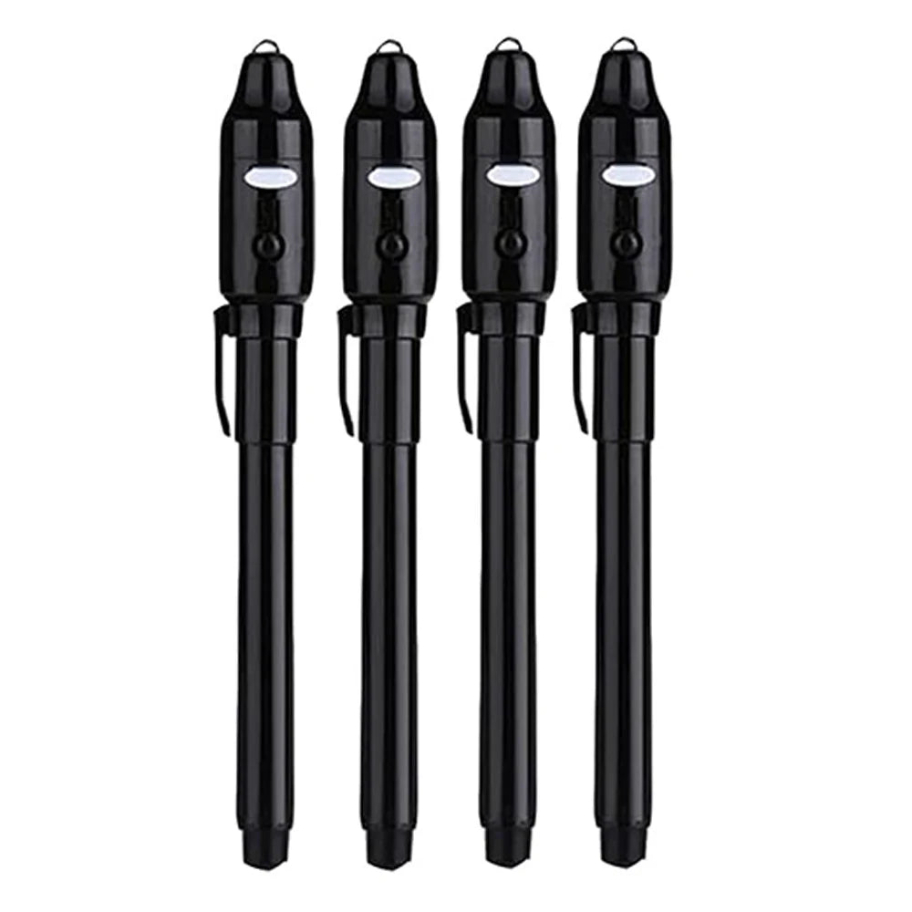 A set of four black invisible ink spy pens with UV light for secret messages