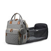 Sac à langer gris avec station de changement et poches de rangement intégrées.