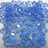A collection of faceted blue glass bicone beads for jewelry making.