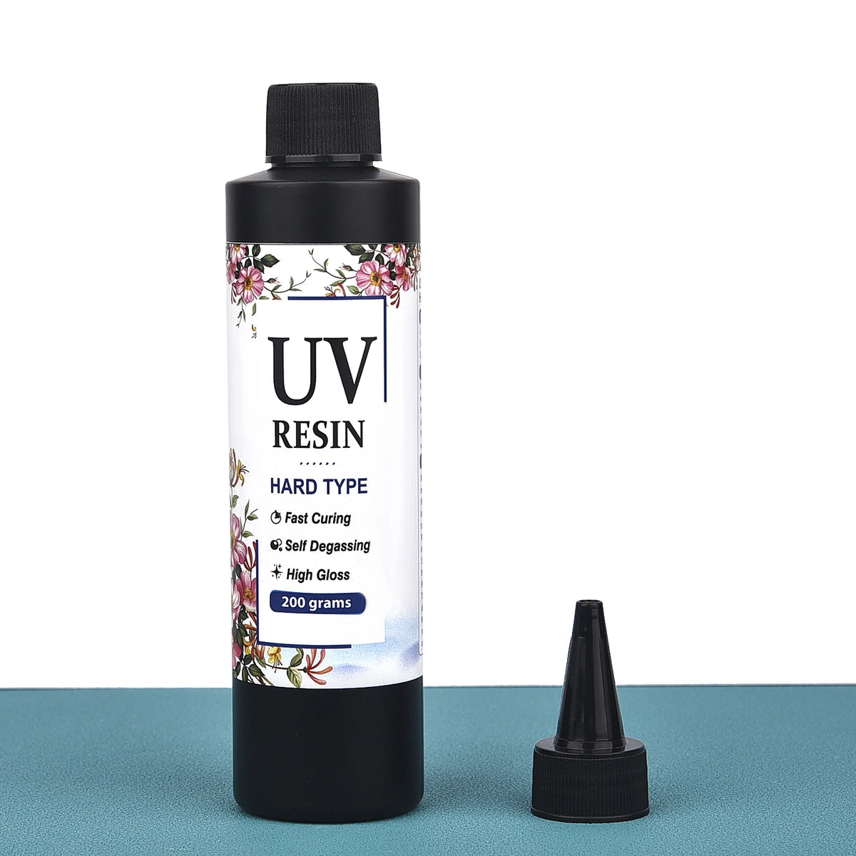 A black bottle of UV resin used for hard type curing and self-degassing in jewelry making.