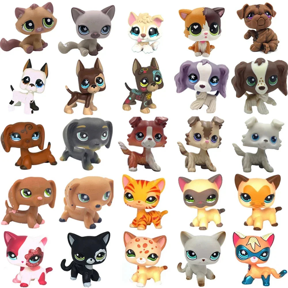 A collection of charming bobblehead pet figurines featuring various breeds including a dachshund, kitten, collie, and others.