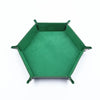 A green hexagonal folding PU leather dice tray with a dark gray rim.