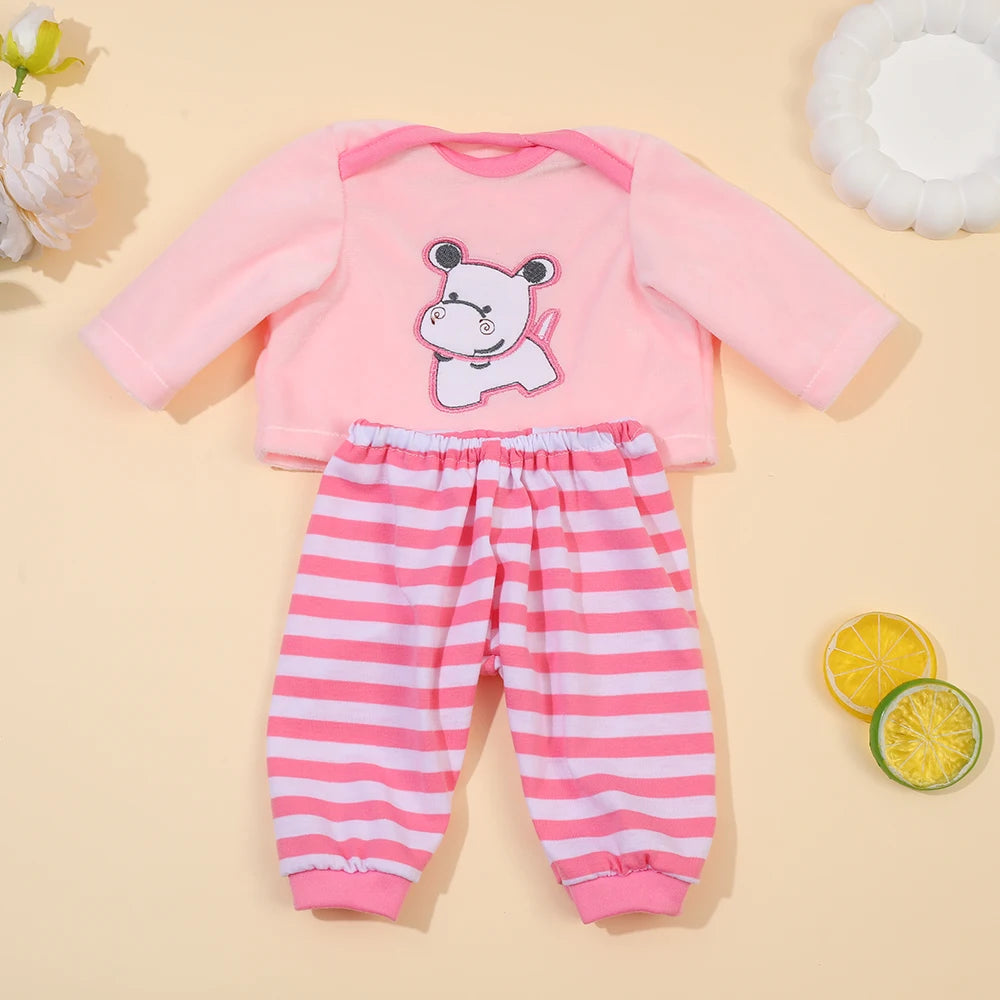 A pink and white animal romper set for a baby, featuring a top with a bear design and striped pants.