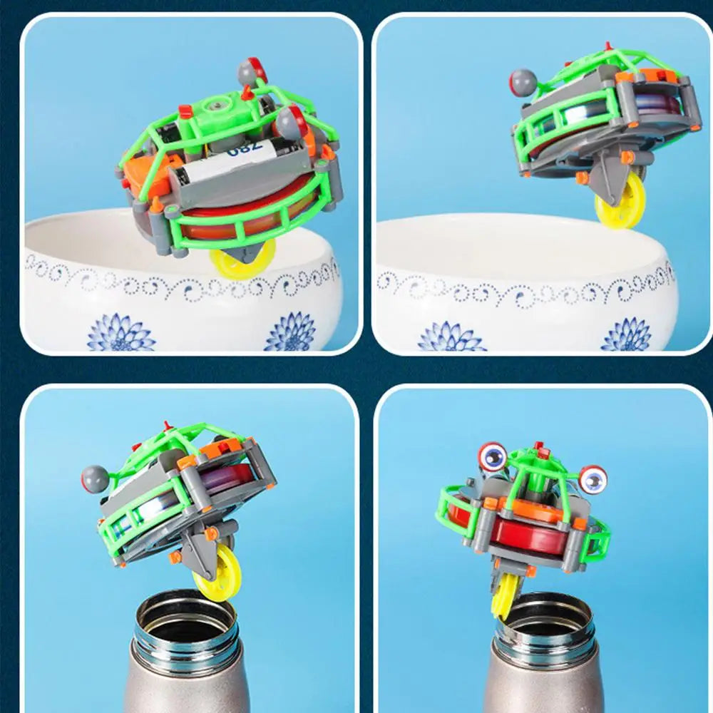 A green and orange gyroscopic unicycle fingertip spinner toy shown in various configurations.