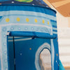 A blue and white striped pop-up play tent shaped like a rocket ship for children.