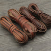Several bundles of brown faux leather cords used for DIY jewelry making