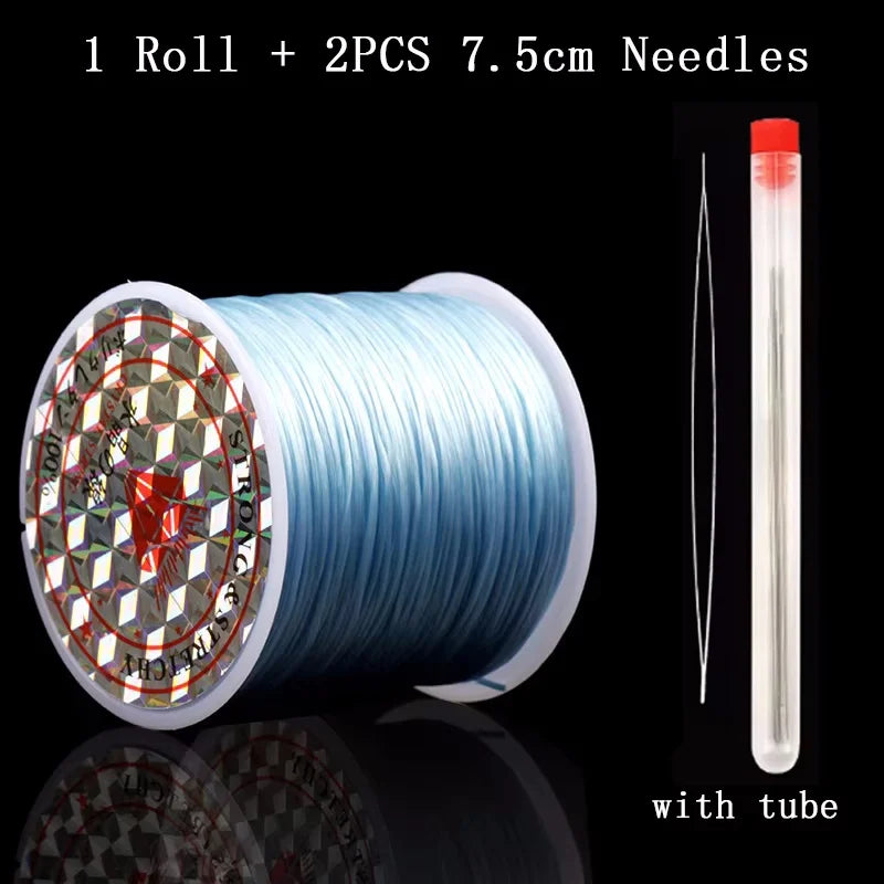 A roll of blue elastic beading cord with two 7.5cm needles and a clear tube.