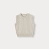 A beige knit sweater for a toddler, featuring a ribbed texture.
