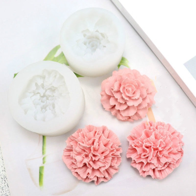 Pink ruffled silicone flower molds for soap, candle, and cake decorating