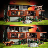 A detailed model of a haunted vampire villa built from building blocks featuring dark wood and green landscaping.