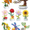 A collection of building block flowers and plants featuring roses, sunflowers, and various colorful blooms.
