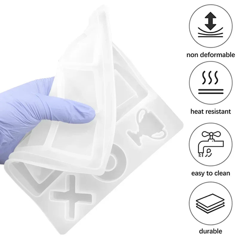 A hand is pressing a silicone mold for a customizable tic-tac-toe game piece, highlighting its non-deformable and durable fea
