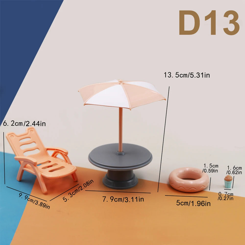 A set of miniature furniture and bathroom accessories for a dollhouse, including a chair, a round item, and an umbrella.