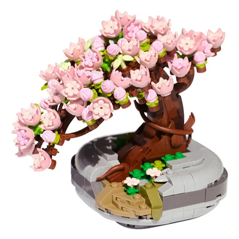 A building block set depicting a tree covered in pink and white flowers.