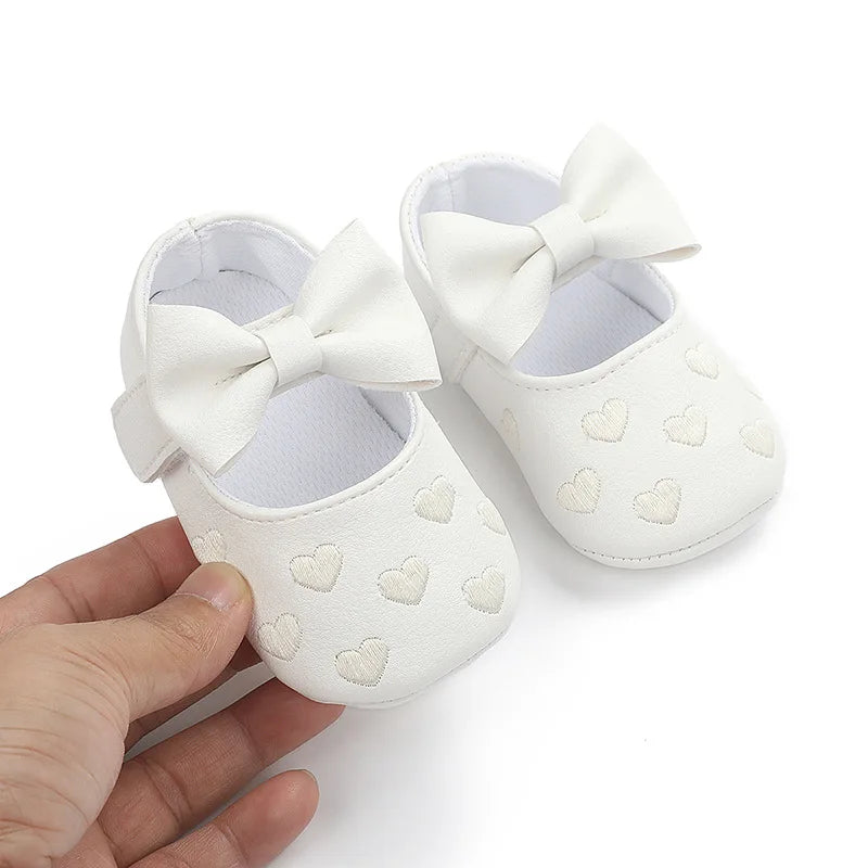 White baby girl bow-knot first walker shoes with a soft anti-slip sole