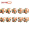 A set of ten yellow 3D maze puzzle balls used for a brain teaser challenge.