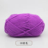 Purple pre-dyed milk cotton yarn in a ball for knitting and crochet