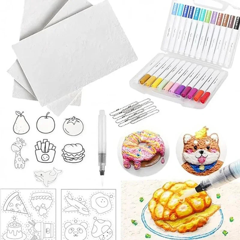 A bubble painting kit showing white foam art paper, markers, and various food-themed designs.
