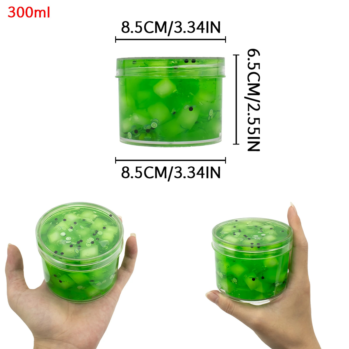 A hand holds a clear plastic jar of green jelly putty slime kit containing fruit pieces like leaves, watermelon, and grape sc
