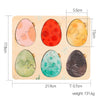 A wooden puzzle featuring five colorful, egg-shaped sorting pieces for toddlers.