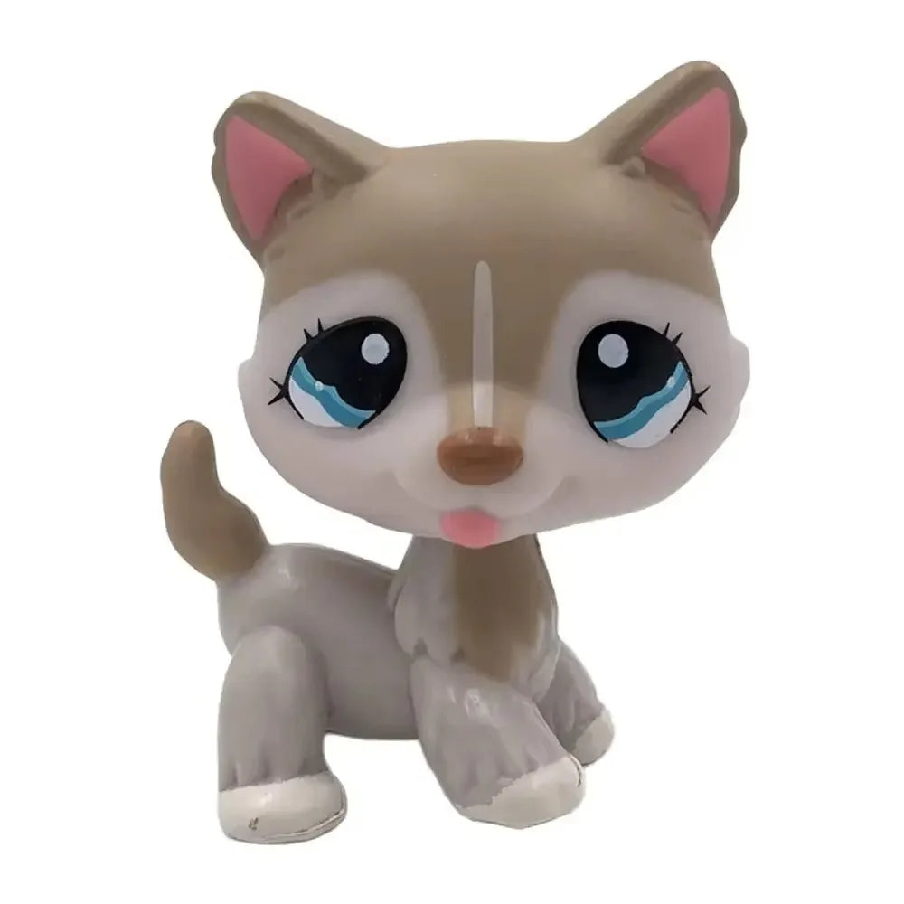A small, light brown Bobblehead toy of a deer with large blue eyes.