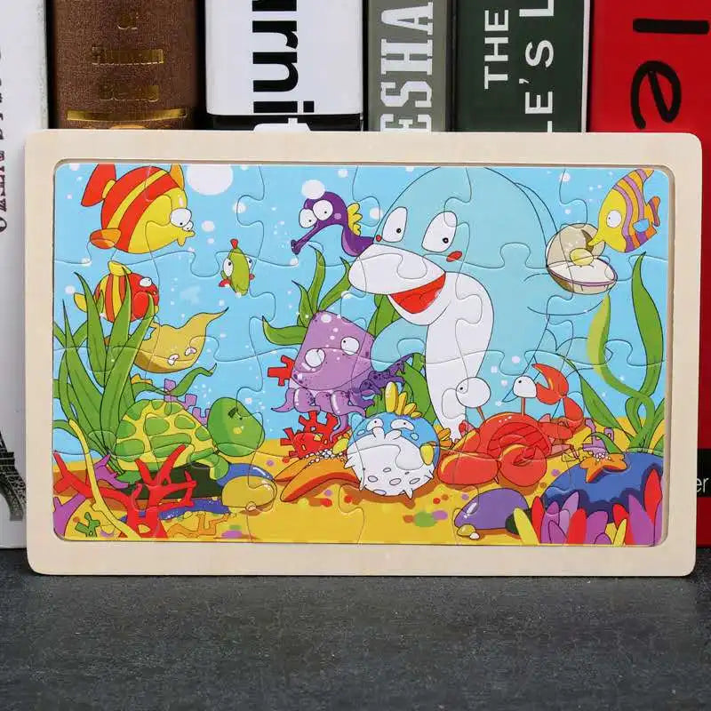 A 24-piece wooden jigsaw puzzle featuring colorful sea animals like a purple fish, a white creature, and various tropical mar