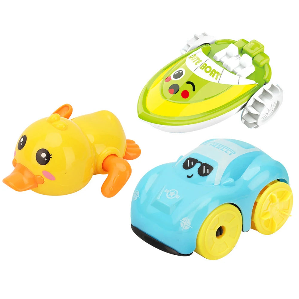 A yellow clockwork duck bath toy and a blue car toy are shown.