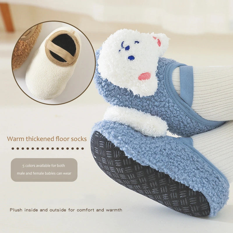 Adorable cartoon bear baby booties in blue and white fleece for warm, soft first steps
