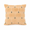 A square pillow cover made of tan sherpa fabric decorated with small green ghost pumpkin patterns.