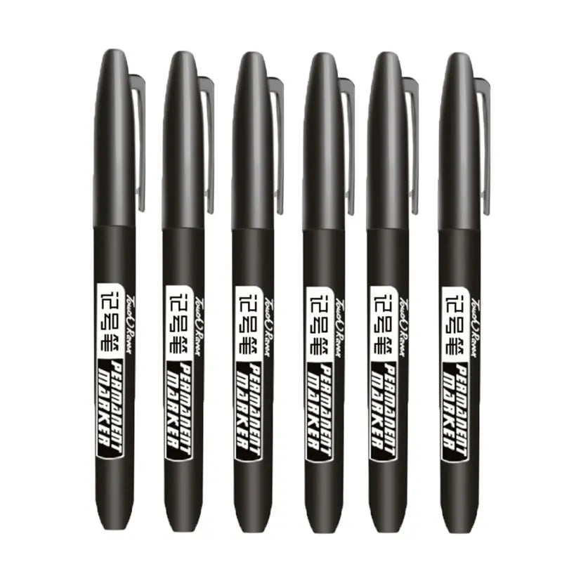 A pack of six black permanent fine-tip markers with silver caps and gold accents.
