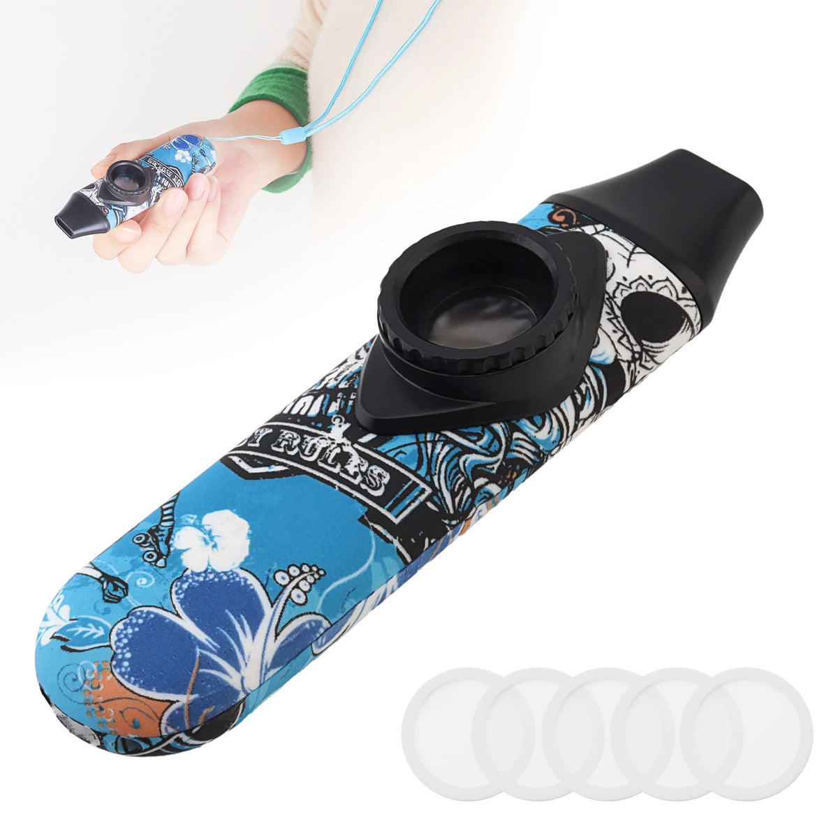 A black kazoo with a blue and black patterned body is shown next to a hand holding a blue lanyard.