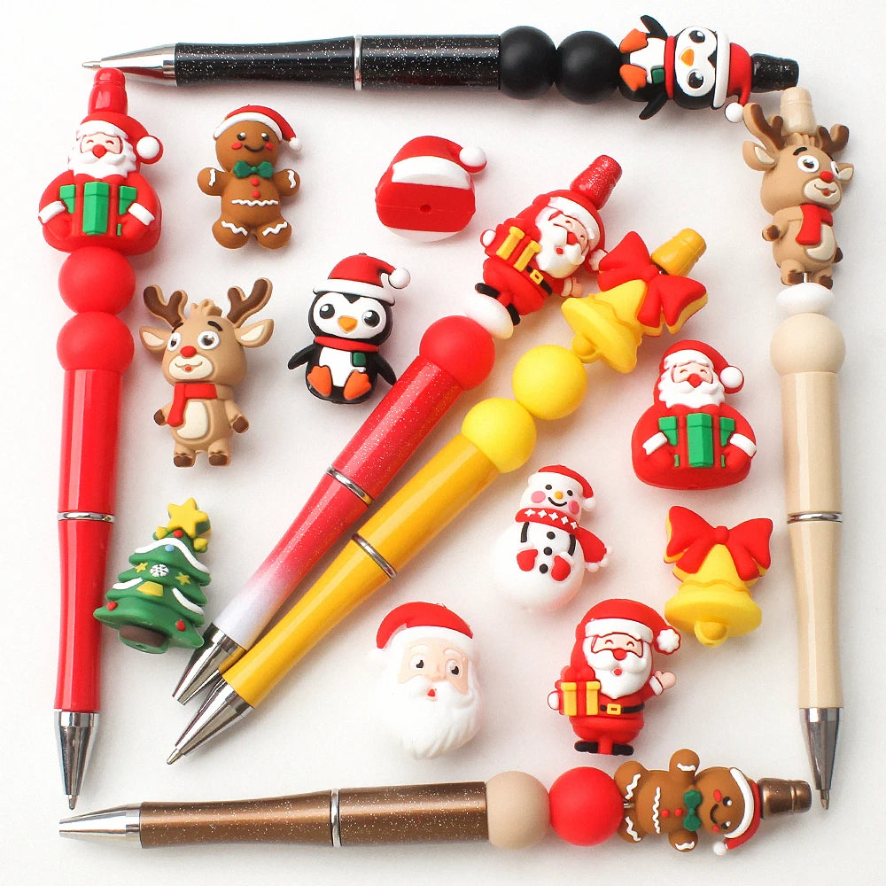 A collection of silicone beads shaped like Santa, reindeer, and Christmas trees used for festive craft jewelry charms.