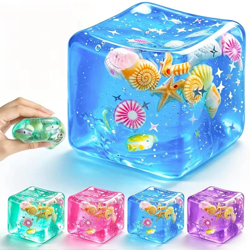 A collection of translucent blue and pink ocean shell squishy stress balls and fidget toys