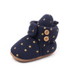 Navy baby winter snow boots with fuzzy ball accents and gold star details