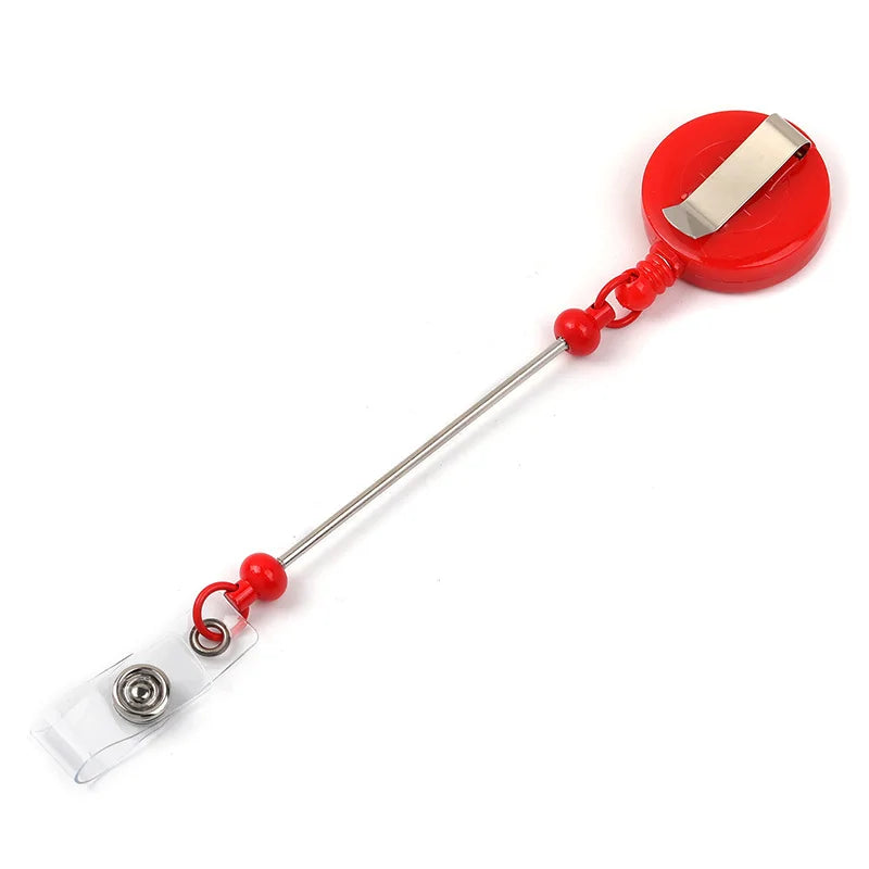 Red beadable badge reel with a retractable silver clip and clear plastic holder