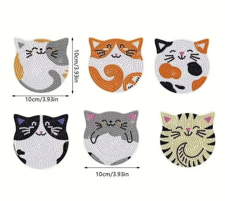 A set of diamond painting coasters featuring various cat mandala designs in orange, white, and black.