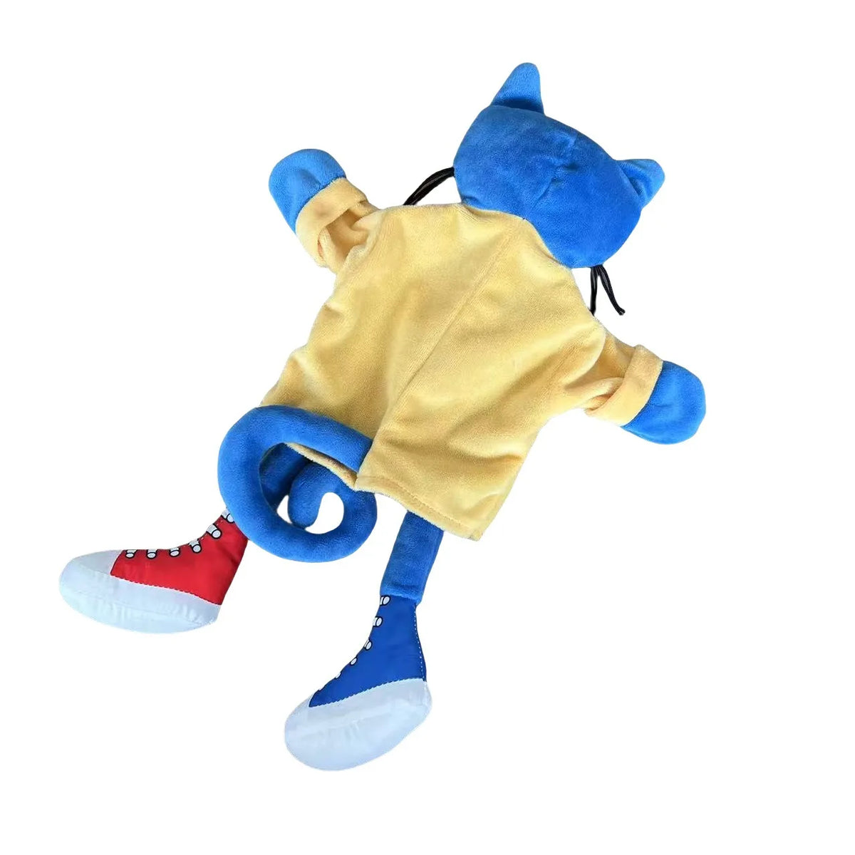 A plush toy of a blue cat wearing a yellow jacket and red boots.