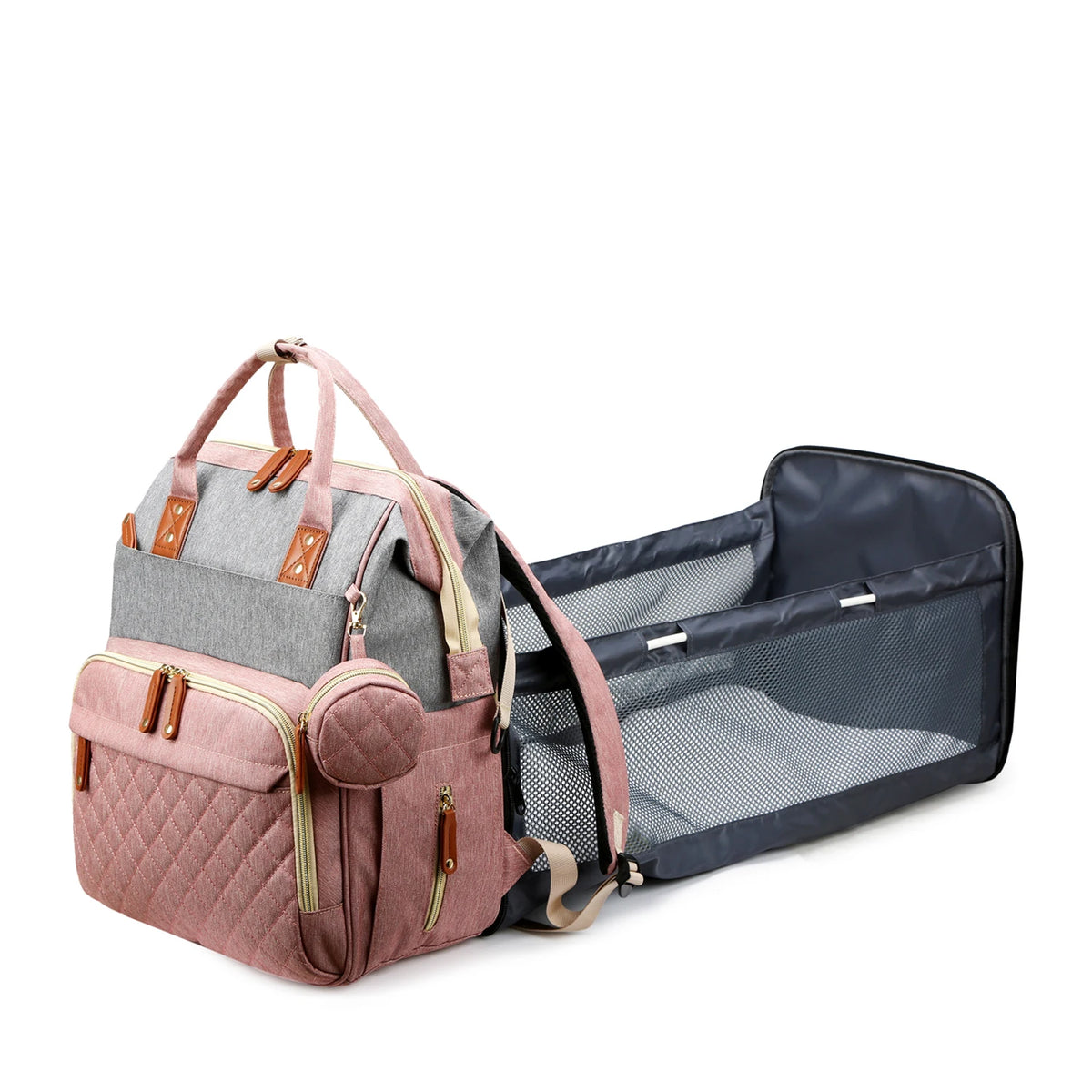 Sac à langer rembourré rose à motif capitonné avec station de changement et rangement en filet.