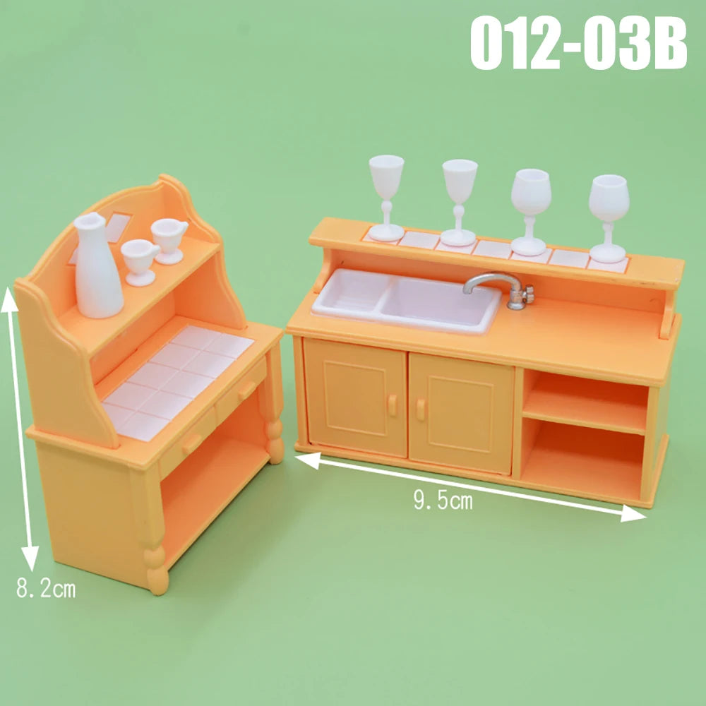 An orange dollhouse kitchen playset featuring a sink, cabinets, and a counter with various white cups.