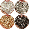 A collection of round spacer beads in various metallic colors including silver, gold, and black.
