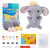 A gray elephant crochet kit for beginners including yarn, tools, and a finished stuffed elephant.