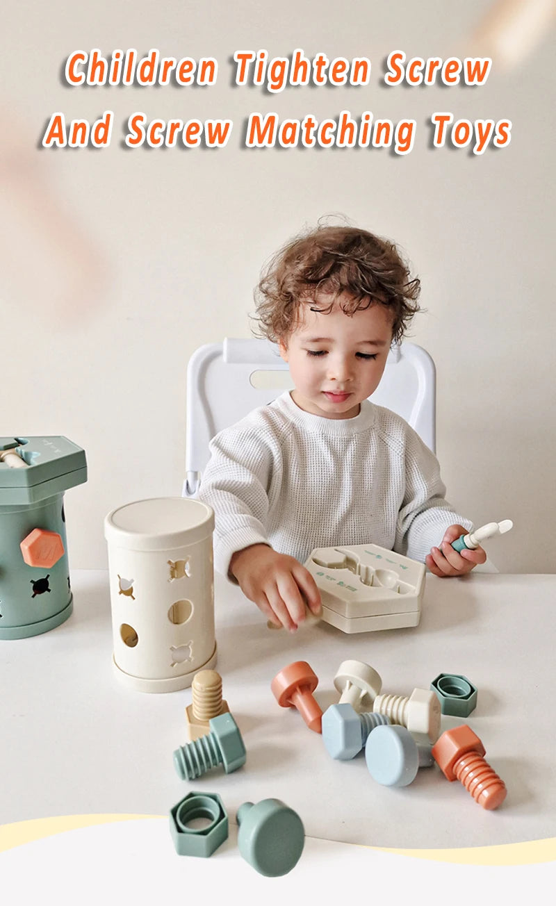 A toddler is playing with a set of wooden screws and matching toys on a table.