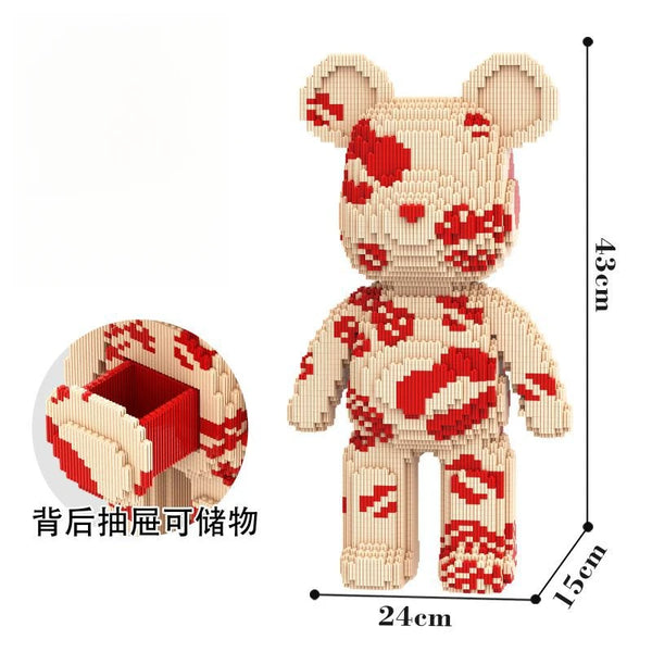 A decorative puzzle model of a bear made from small wooden building blocks with red and white patterns.