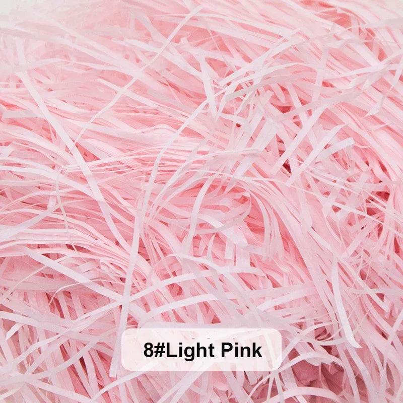 Light pink raffia paper shreds used for gift boxes and baskets
